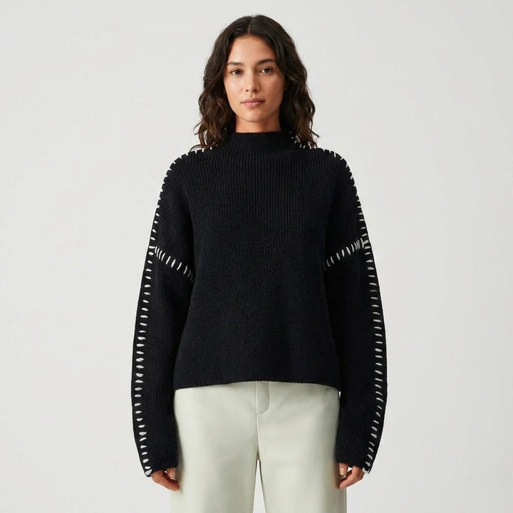 Maglione lavorato a maglia con dettagli artigianali e vestibilità ampia