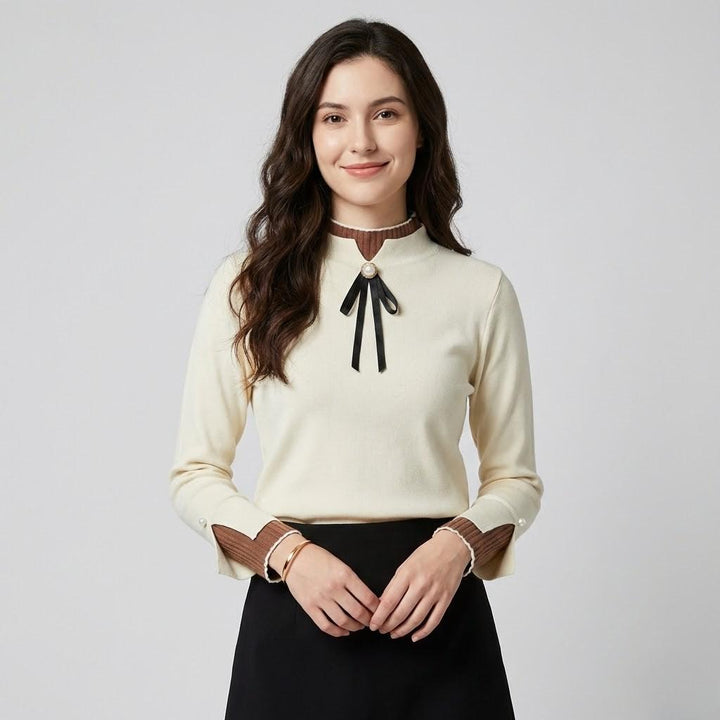 Blusa elegante con fiocco decorativo