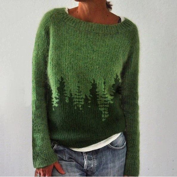 Maglione verde lavorato a maglia con silhouette di foresta sul bordo