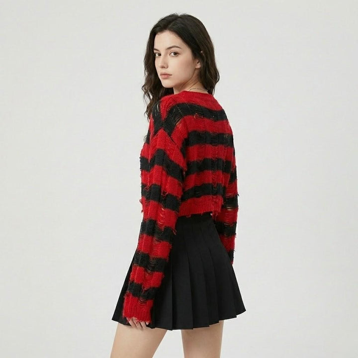 Maglione lavorato a maglia con motivo grafico e bottoni decorativi davanti