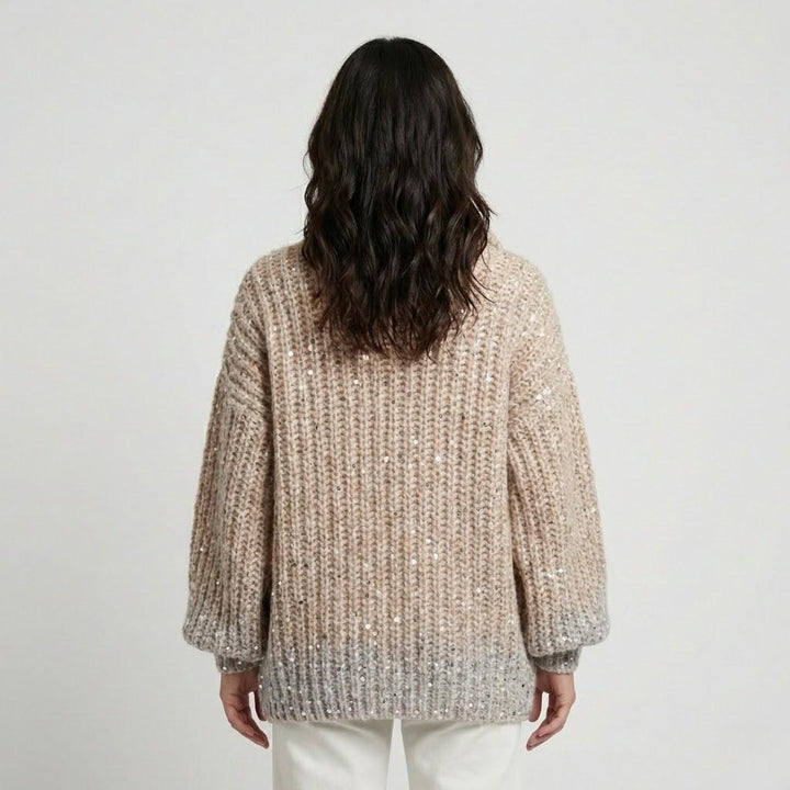 Maglione voluminoso lavorato a maglia con leggero lucido, colletto alto e chiusura frontale