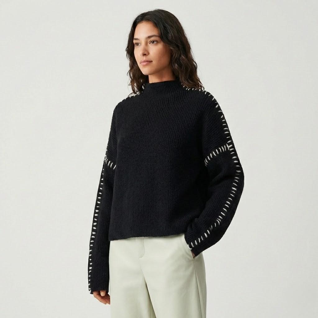Maglione lavorato a maglia con dettagli artigianali e vestibilità ampia