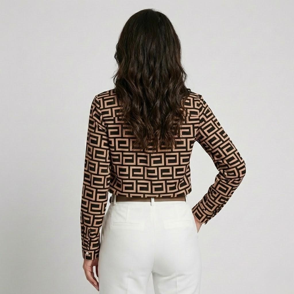 Blusa fluida in misto viscosa con taglio morbido