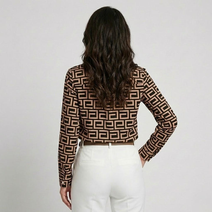Blusa fluida in misto viscosa con taglio morbido