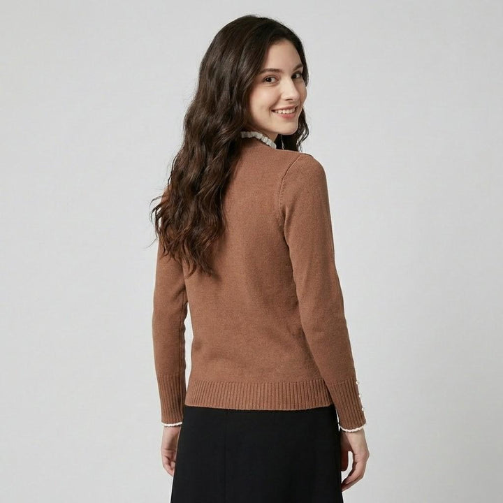 Blusa elegante con fiocco decorativo