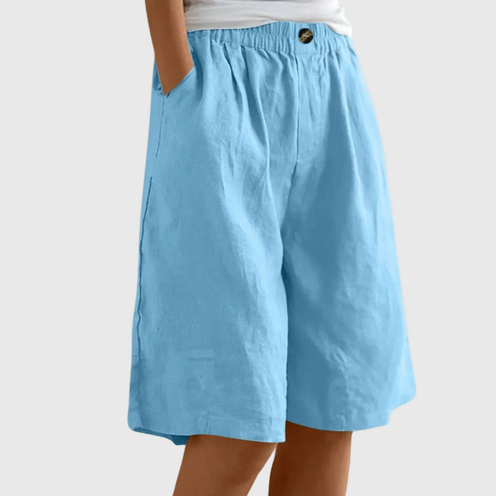 Pantaloni corti larghi fino al ginocchio con cintura elastica e tasche