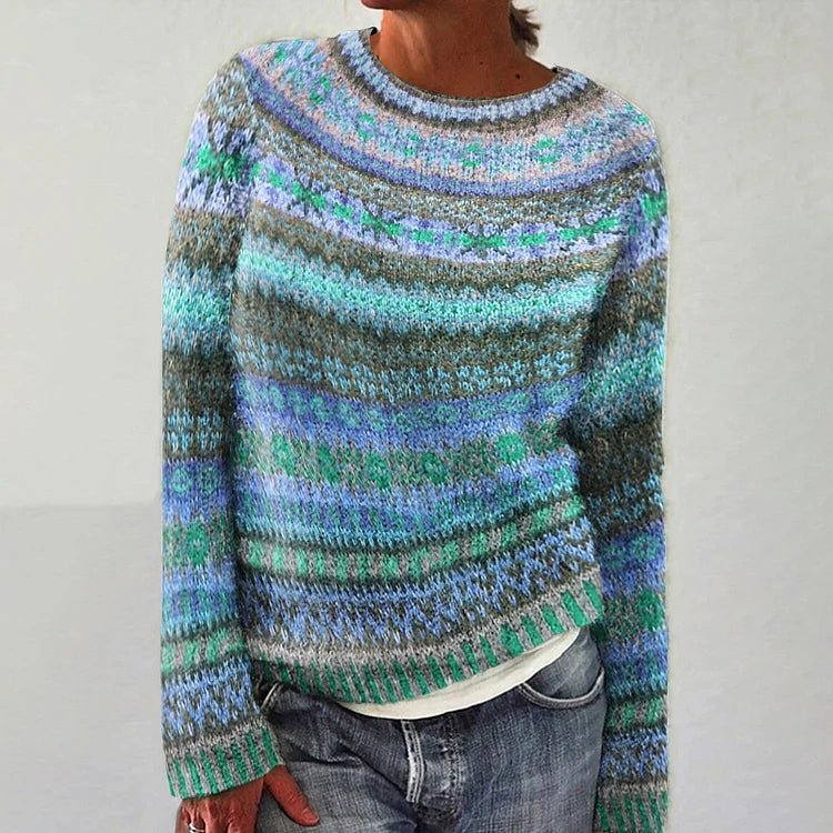 Maglione intrecciato in tonalità menta e blu con un motivo elaborato
