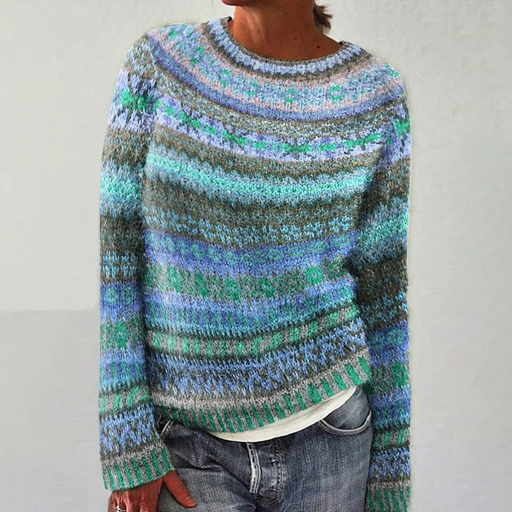 Maglione intrecciato in tonalità menta e blu con un motivo elaborato