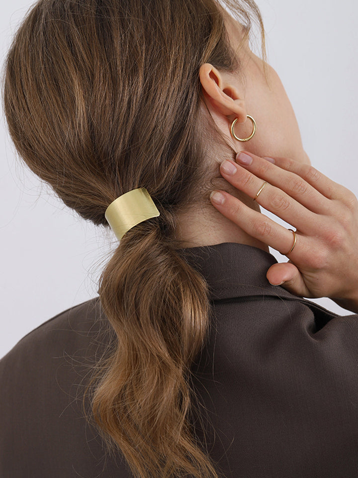 Accessorio lucido per capelli