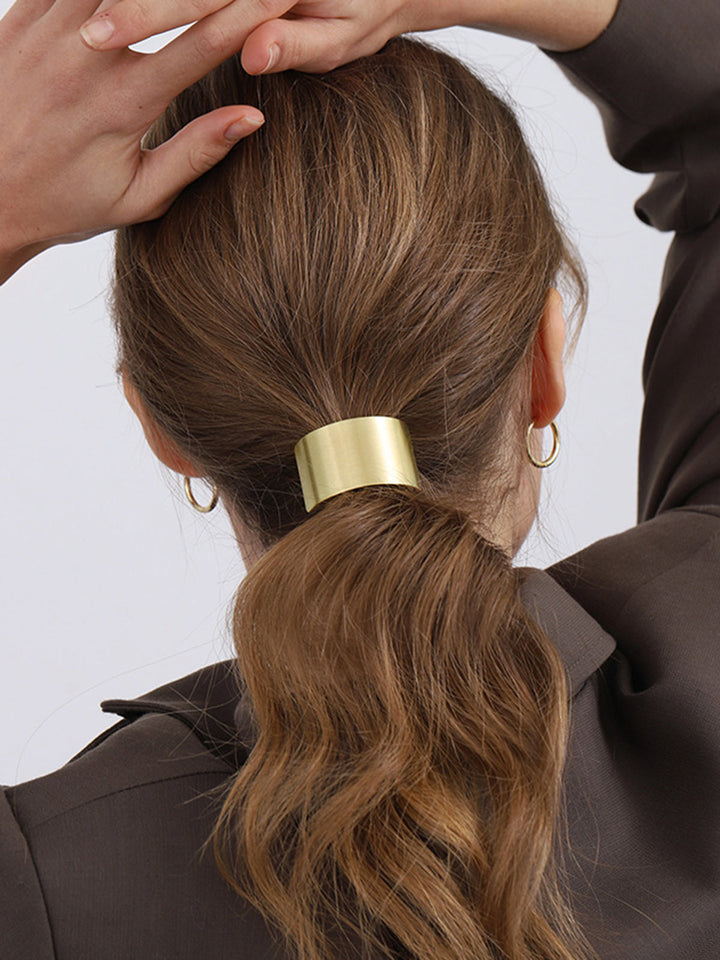 Accessorio lucido per capelli