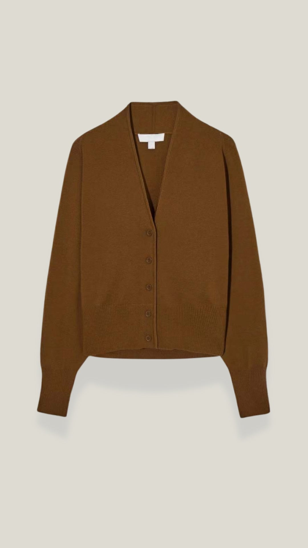 Cardigan lavorato a maglia con scollatura a V in stile senza tempo