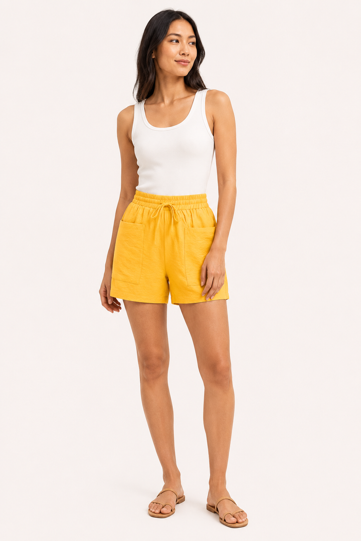 Shorts con cintura elastica e tasche frontali