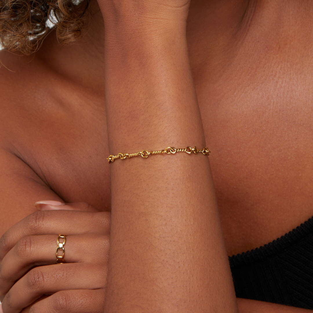Bracciale Figaro in oro con nodo