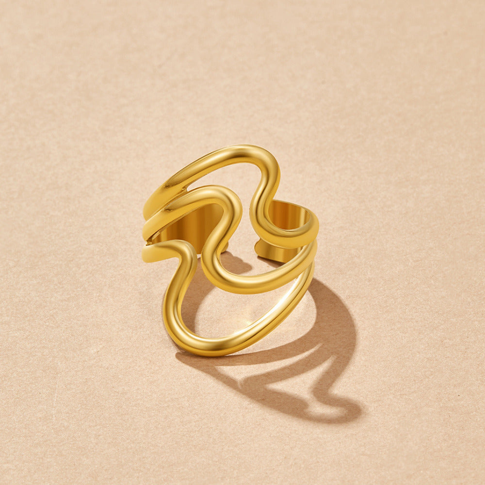 Anello avvolgente in oro con motivo ondulato