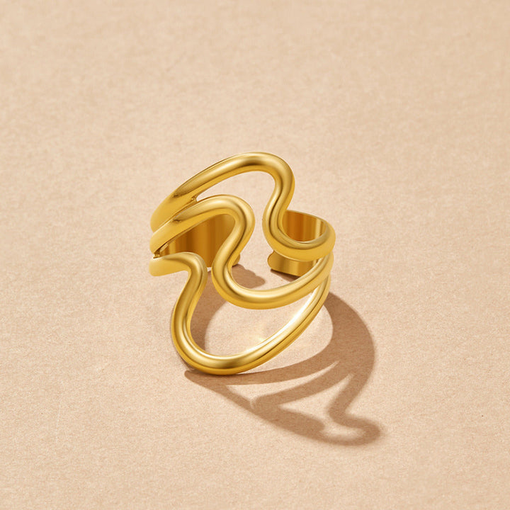 Anello avvolgente in oro con motivo ondulato