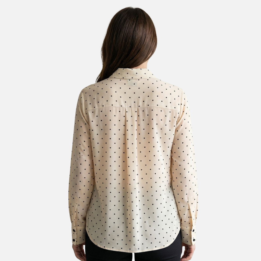 Blusa a pois con fiocco al collo