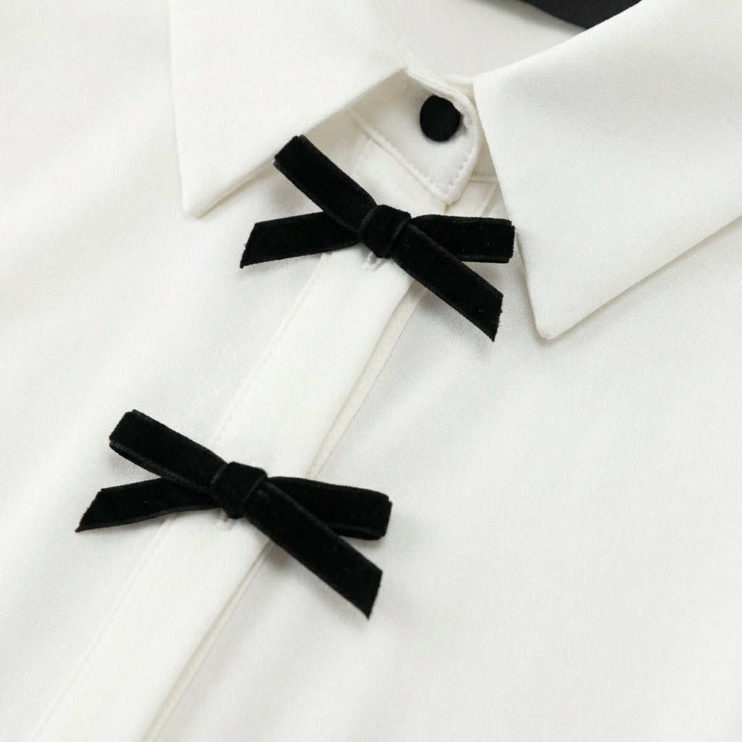 Blusa a pois con fiocco al collo
