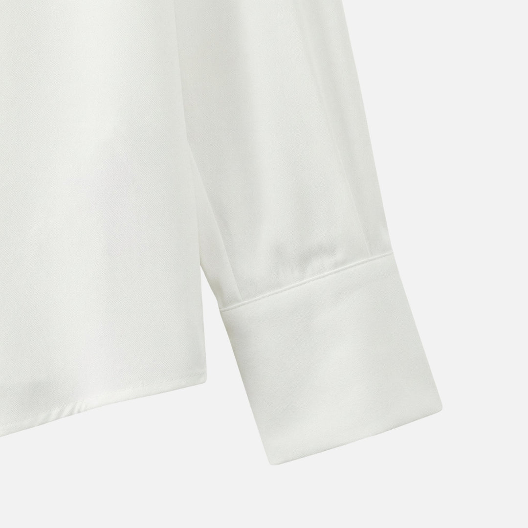 Blusa a pois con fiocco al collo