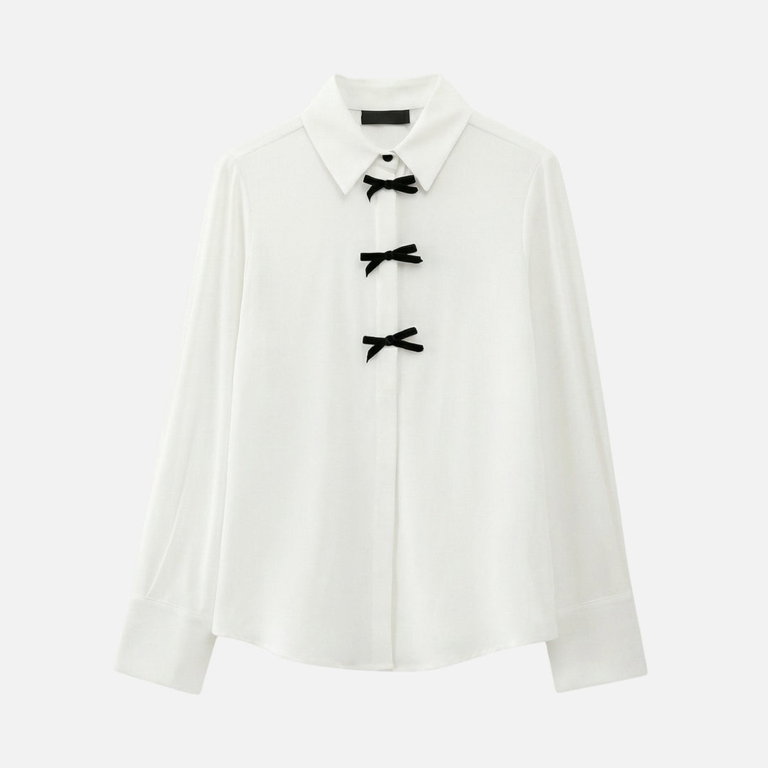 Blusa a pois con fiocco al collo