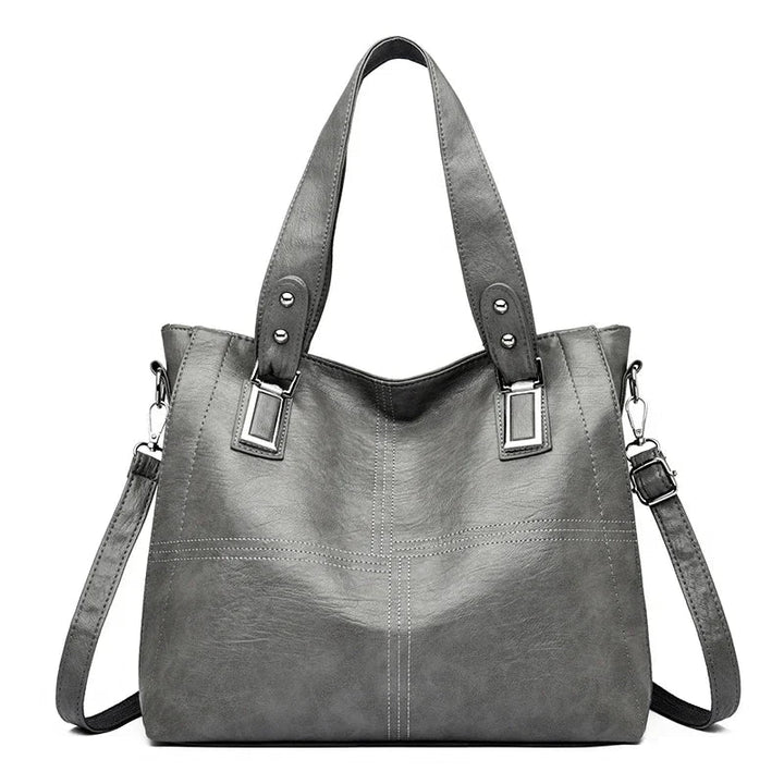 Borsa a tracolla liscia con forma spaziosa