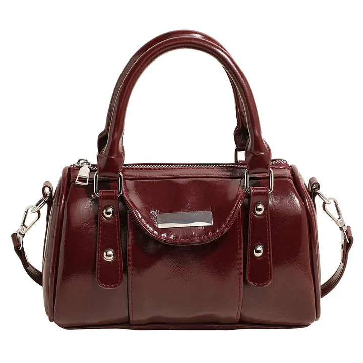Borsa lucida con aspetto liscio