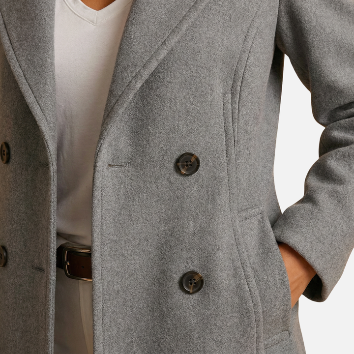 Cappotto lungo elegante con colletto a revers