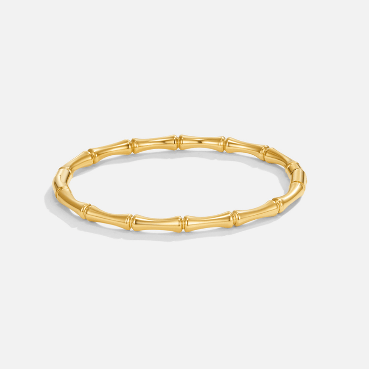 Bracciale rigido dorato Ara con effetto sagomato