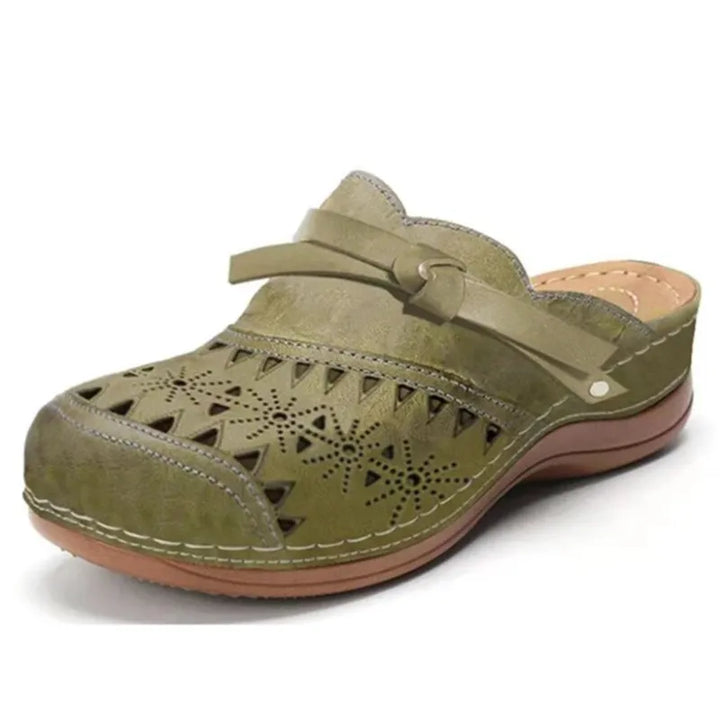 Sandali clog con perforazioni