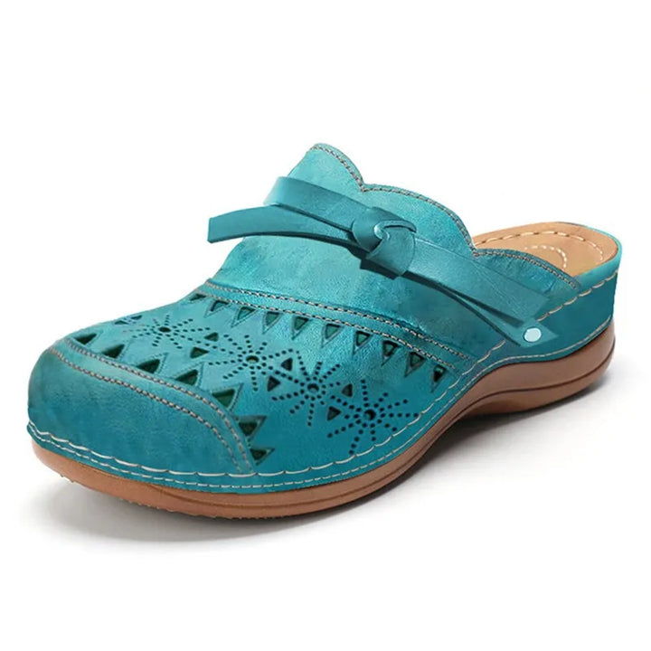 Sandali clog con perforazioni