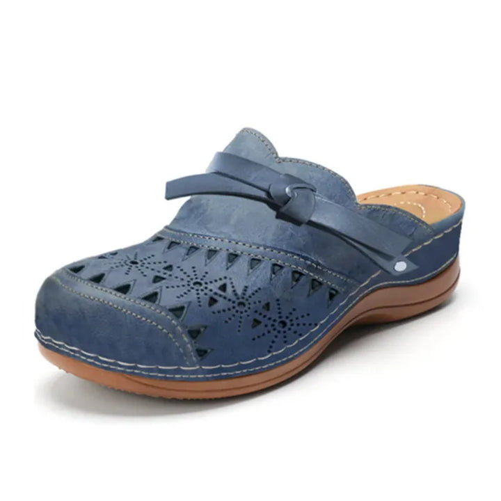 Sandali clog con perforazioni