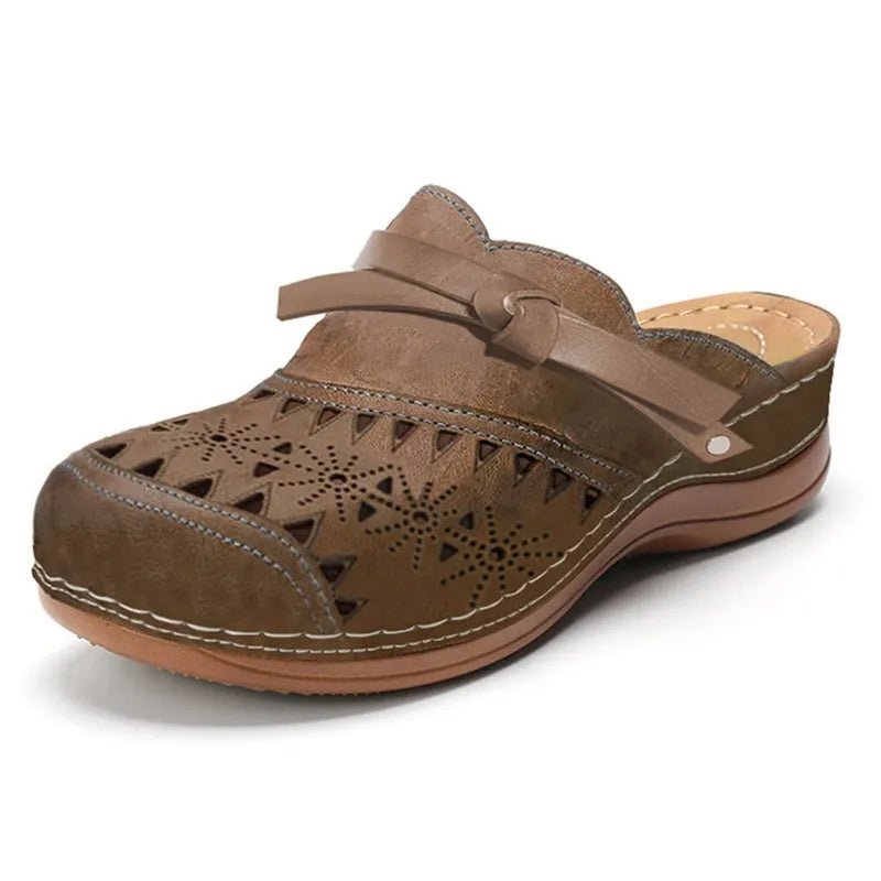 Sandali clog con perforazioni