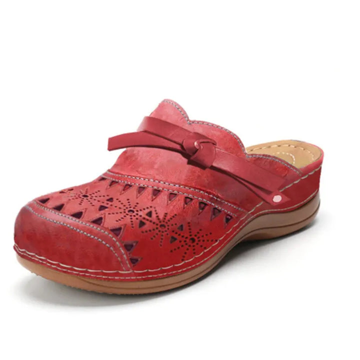 Sandali clog con perforazioni