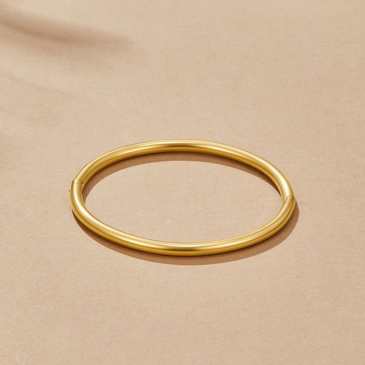 Bracciale rigido dorato Eli