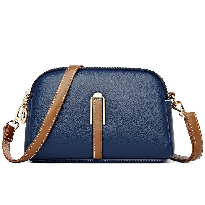 Questa borsa a tracolla compatta è ideale per le giornate piene di movimento