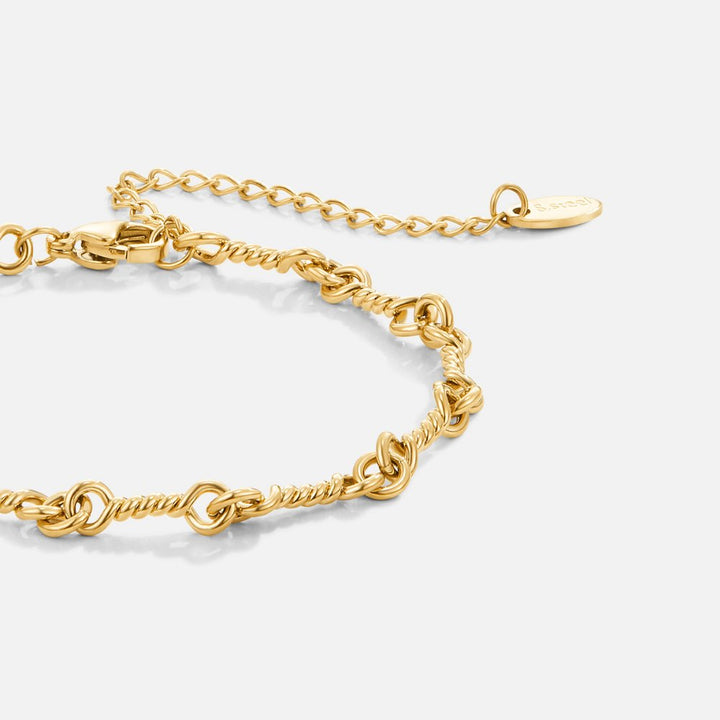 Bracciale Figaro in oro con nodo