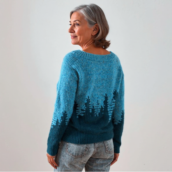 Maglione blu a maglia con motivo boschivo