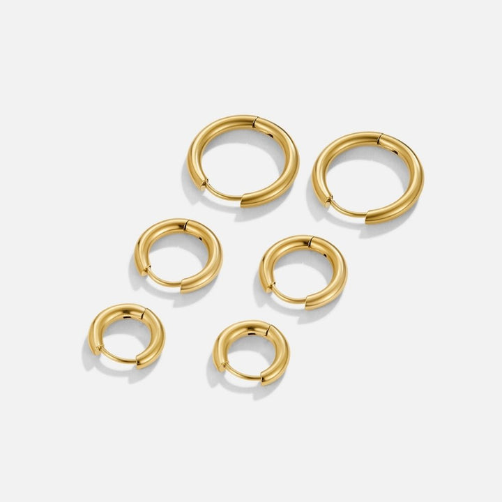 Set di tre orecchini mini a cerchio dorati