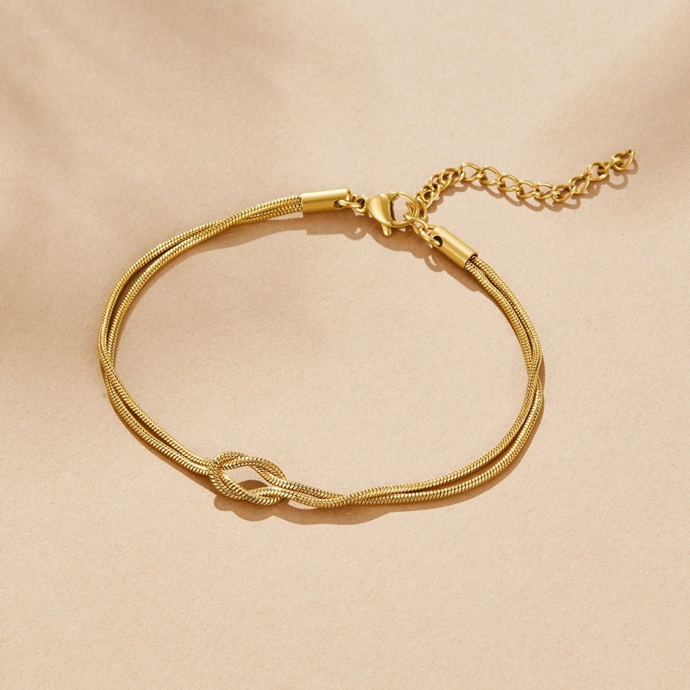 Bracciale in oro con nodo