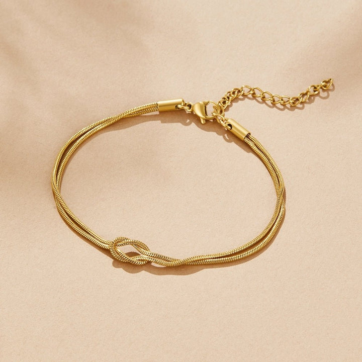 Bracciale in oro con nodo
