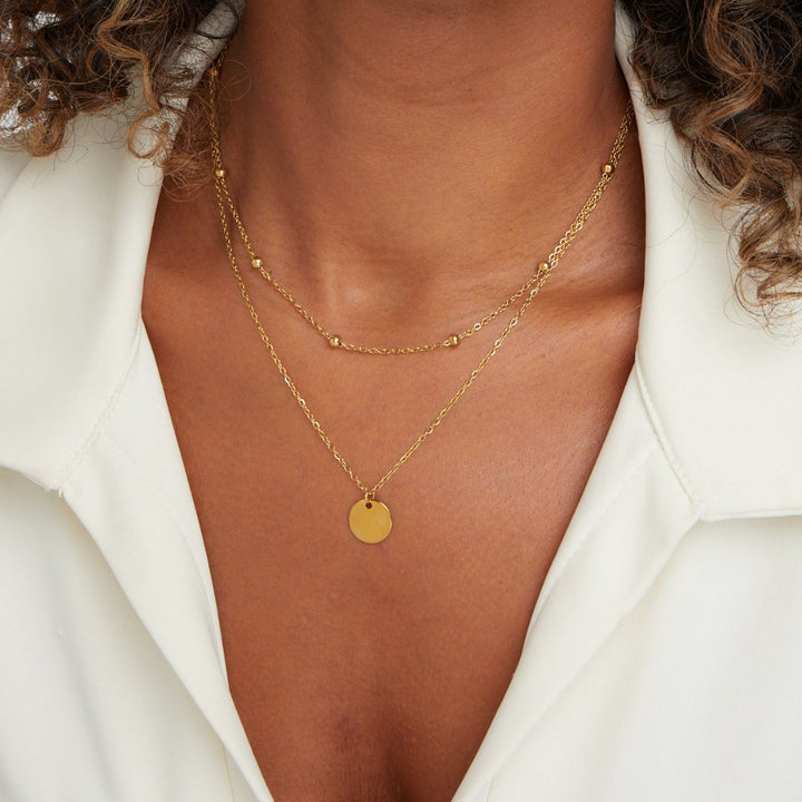 Collana a strati con dischi