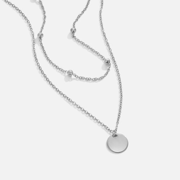 Collana a strati in argento con dischi