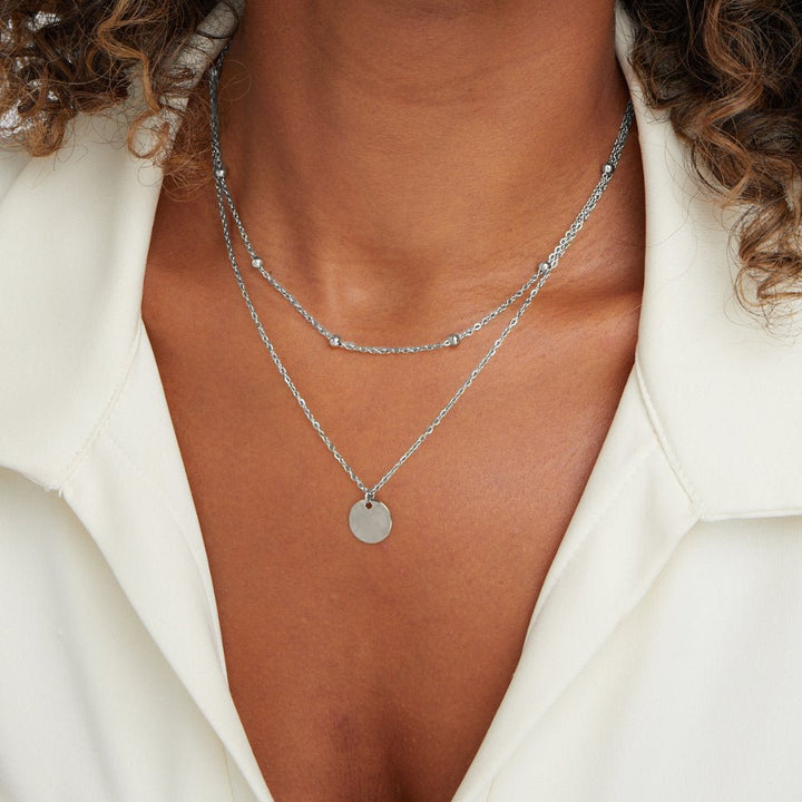 Collana a strati in argento con dischi