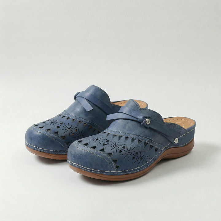 Sandali clog con perforazioni
