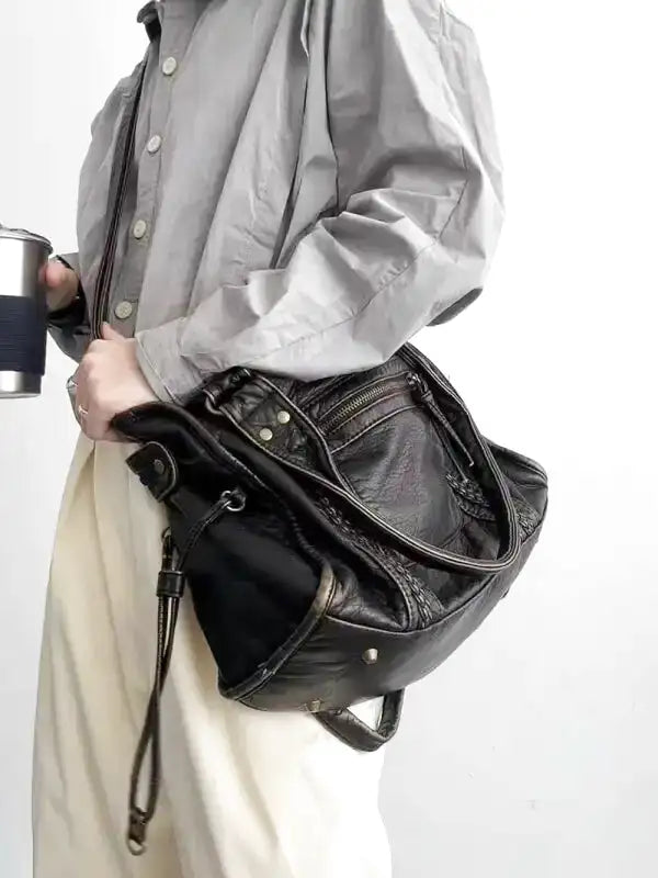 Borsa a tracolla rigida e liscia
