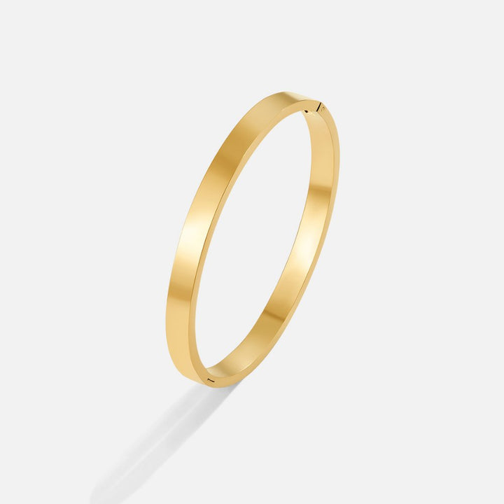 Bracciale rigido dorato Rina
