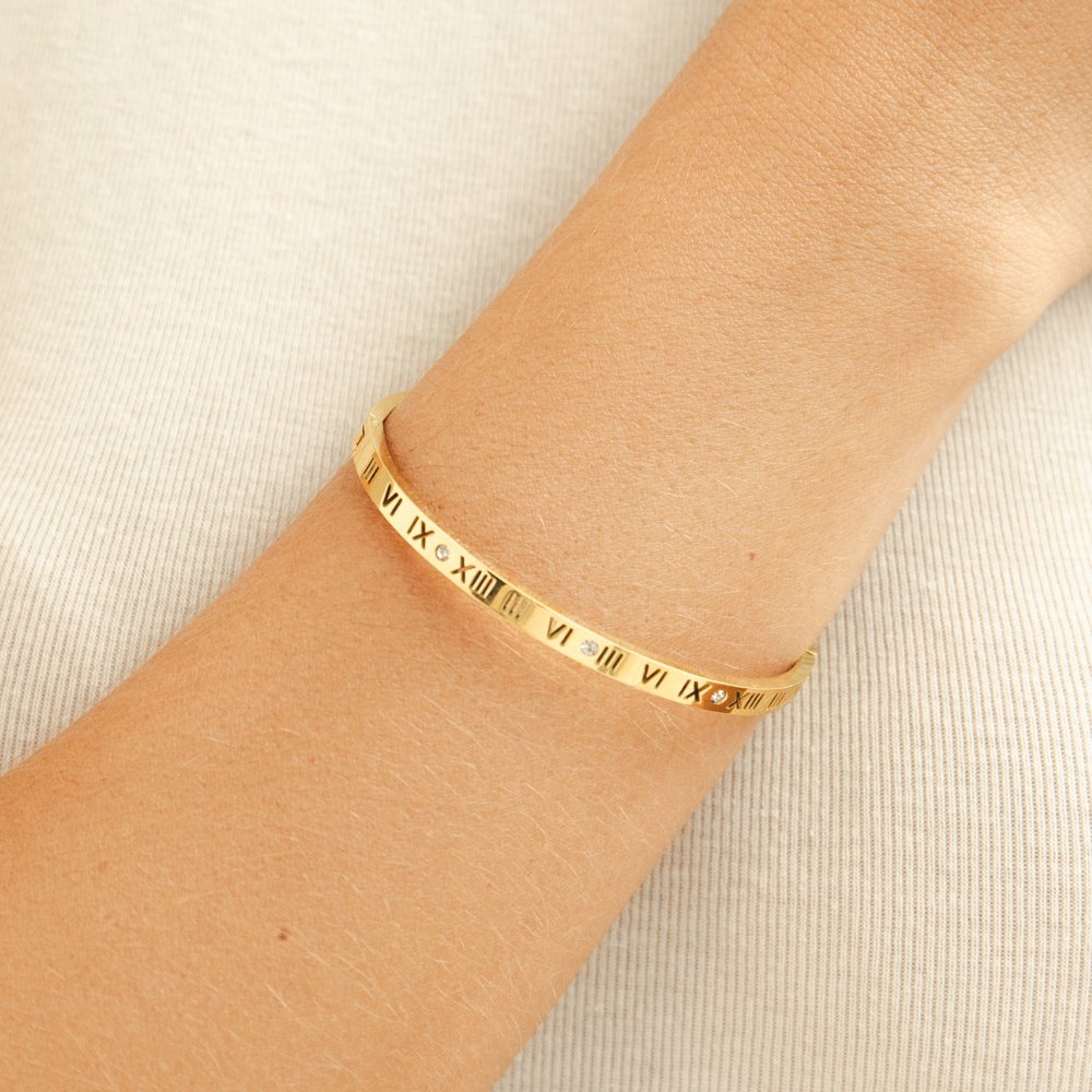 Bracciale rigido dorato Roman
