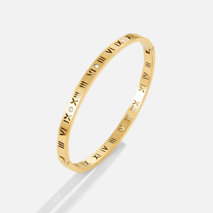 Bracciale rigido dorato Roman