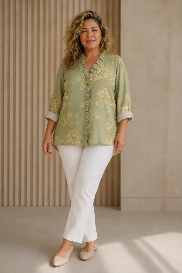 Belinda | Blusa floreale con orlo asimmetrico