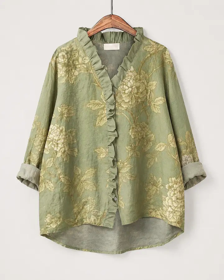 Belinda | Blusa floreale con orlo asimmetrico