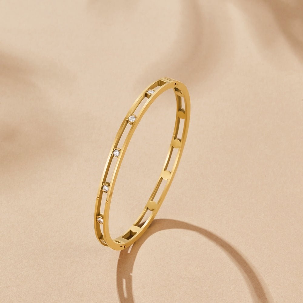 Bracciale rigido dorato Sofia con dettagli lucidi